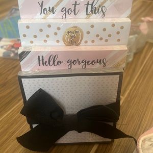 Stacked memo pads pink gold and black